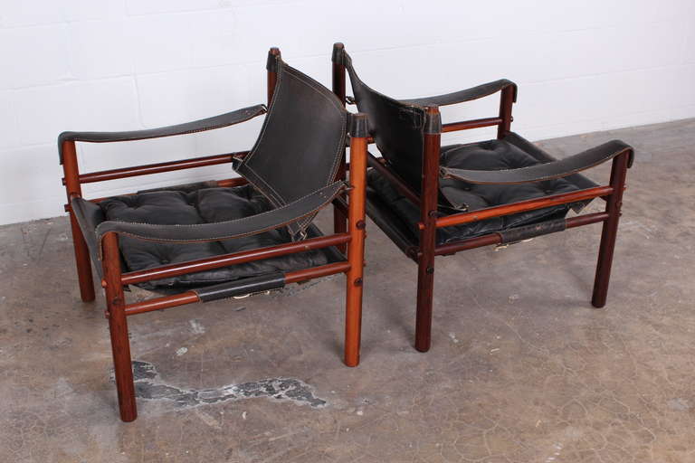 Mid-20th Century Pair of Rosewood Safari Chairs by Arne Norell
