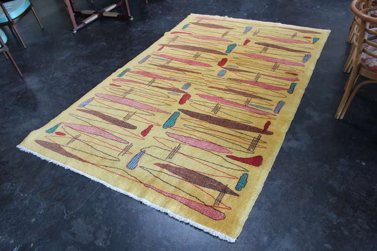 A French modernist rug with surrealistic pattern.