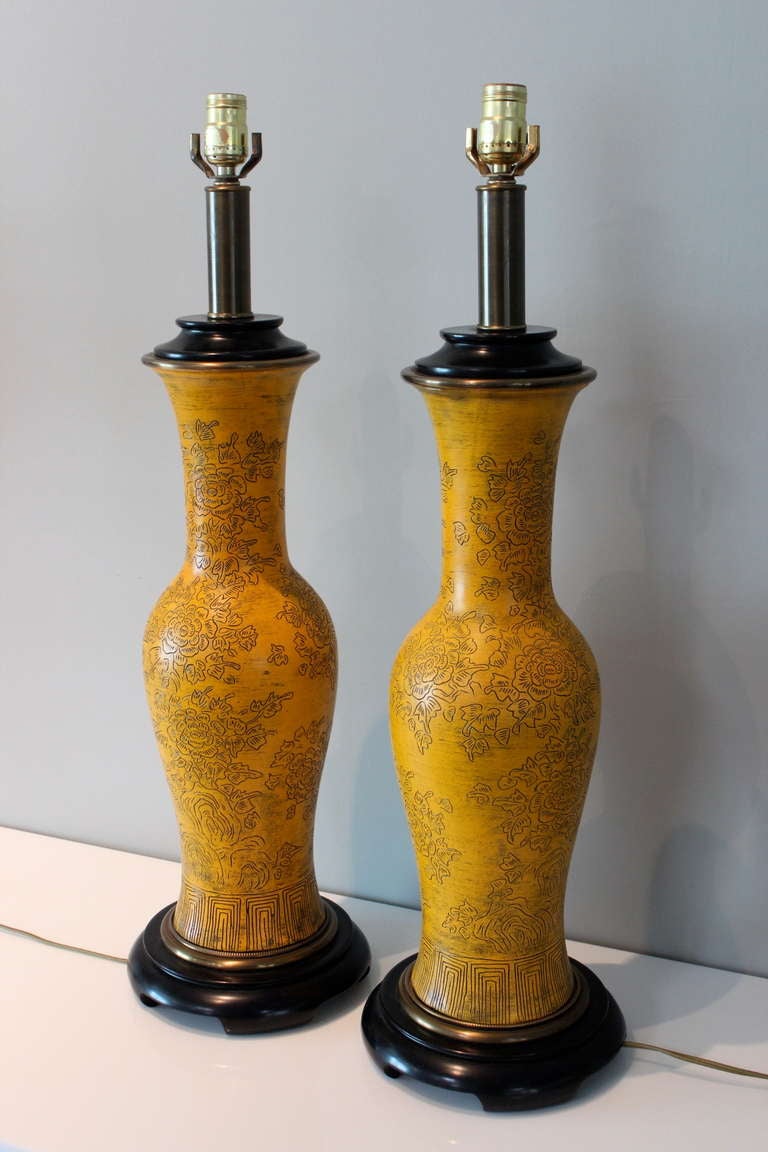 A beautifully detailed pair of table lamps by Paul Hanson.