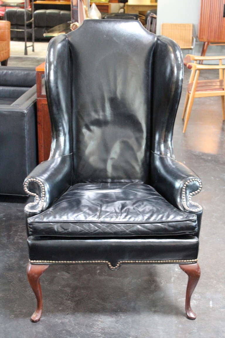 American Beautifully Patinated Leather Wingback Chair and Ottoman