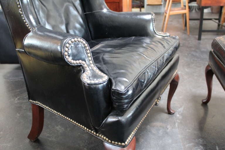 Mid-20th Century Beautifully Patinated Leather Wingback Chair and Ottoman