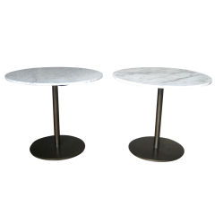 Pair of Bronze and marble tables by Hugh Acton