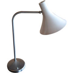 Swiveling desk lamp by Nessen
