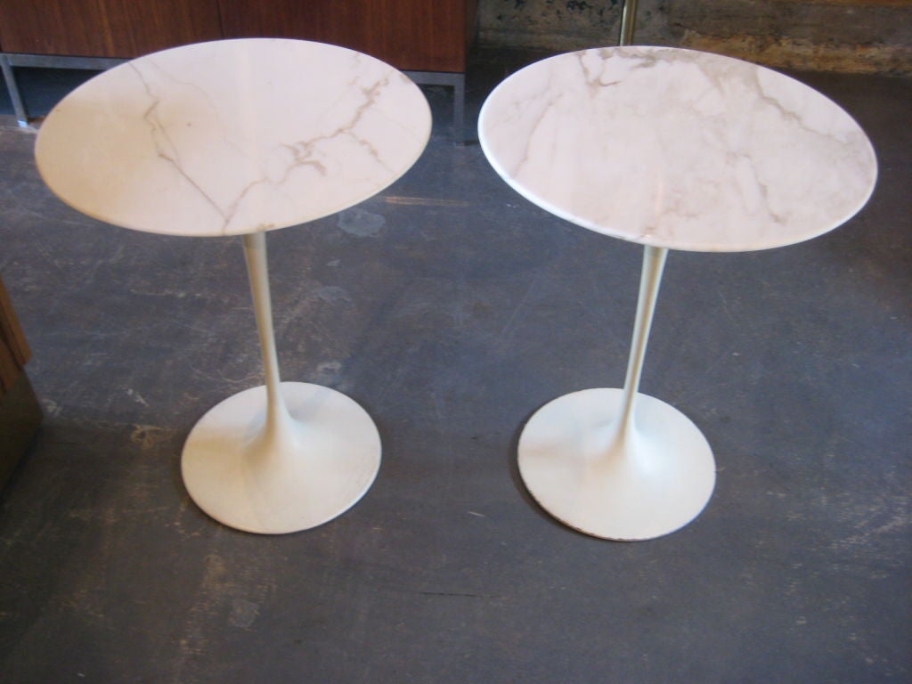 Vintage tulip tables with Carrera Gold marble tops. Designed by Eero Saarinen for Knoll. Priced individually. Several available.