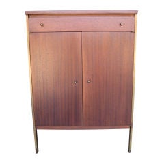 Mahogany and brass cabinet by Paul McCobb