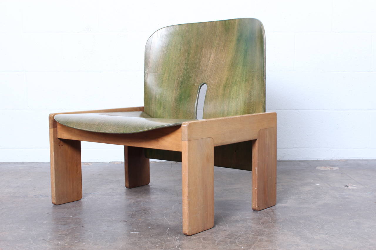 A nicely patinated green aniline lounge chair #925 designed by Tobia and Afra Scarpa.