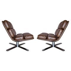 Pair of swivel chairs designed by John Follis