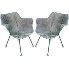 Pair of outdoor armchairs by Russell Woodard