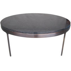 Bronze and black granite table by Nicos Zographos