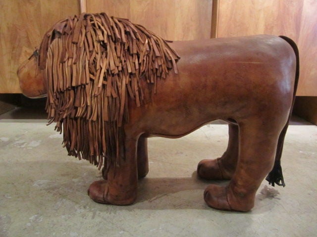 An unusual leather lion ottoman by Abercrombie & Fitch.  Other animals also available.