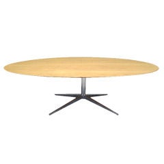 Large oak elliptical table/desk by Florence Knoll
