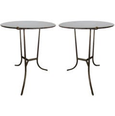 Pair of bronze and granite tables by Cedric Hartman
