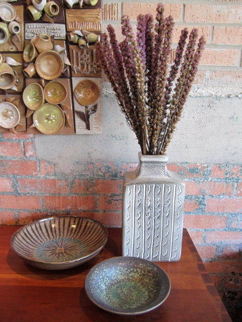 Three pieces of studio pottery by Harding Black. <br />
1. Small bowl (8.25 x 2.25) $700.<br />
2. Large bowl (11.75 x 2.5) $1100.<br />
3. Vase (7 x 5 x 13)  $1300.