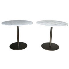 Pair of Bronze and marble tables by Hugh Acton