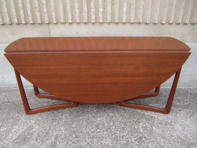Teak drop leaf table by Peter Hvidt
