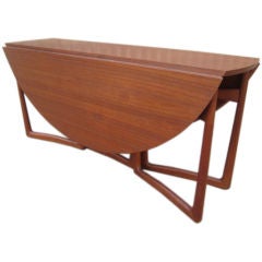 Teak drop leaf table by Peter Hvidt