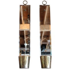 Vintage Pair of mirrored sconces by Tommi Parzinger