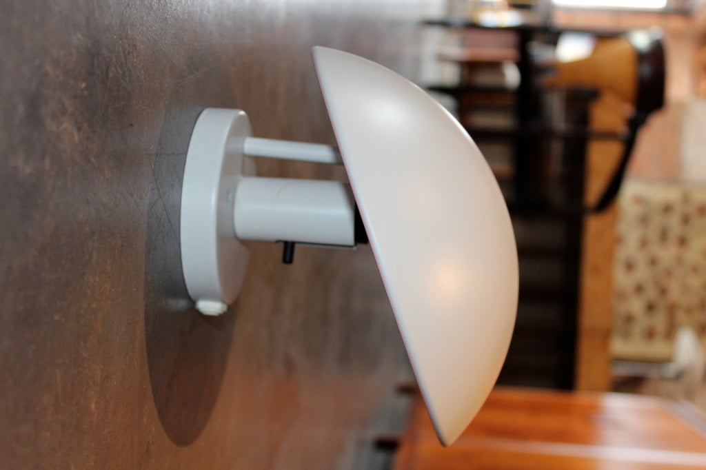 The PH-Hat sconce by Poul Henningsen for Louis Poulsen, Denmark. We have four available. Priced and sold individually.