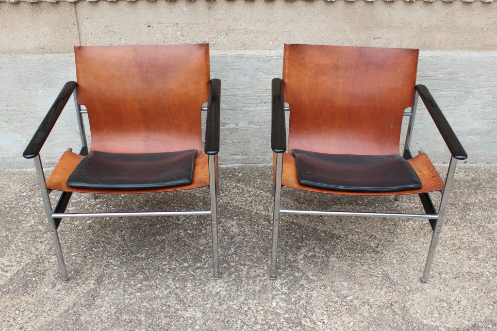 The best pair of Pollock #657 chairs I've every owned. The patina is just perfect. The leather is beautifully aged and worn.