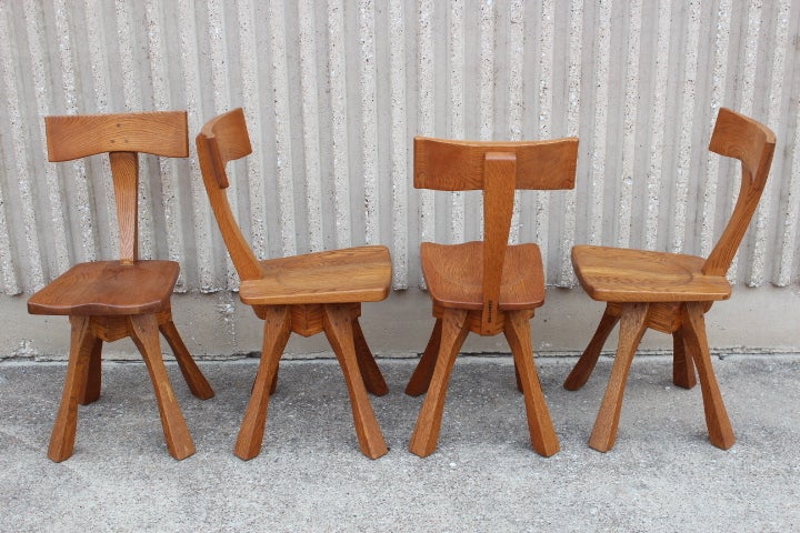An amazing set of four California craft dining chairs by Erik Gronborg. 

Artist Erick Gronborg (b. 1931) is a Danish artist who came to the United States in 1959 to UC Berkeley, where he was instrumental in developing the artist foundry movement
