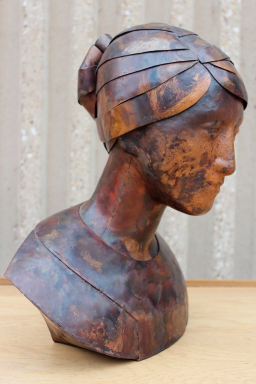 A gorgeous copper bust with great detail by artist Mary Eldredge.