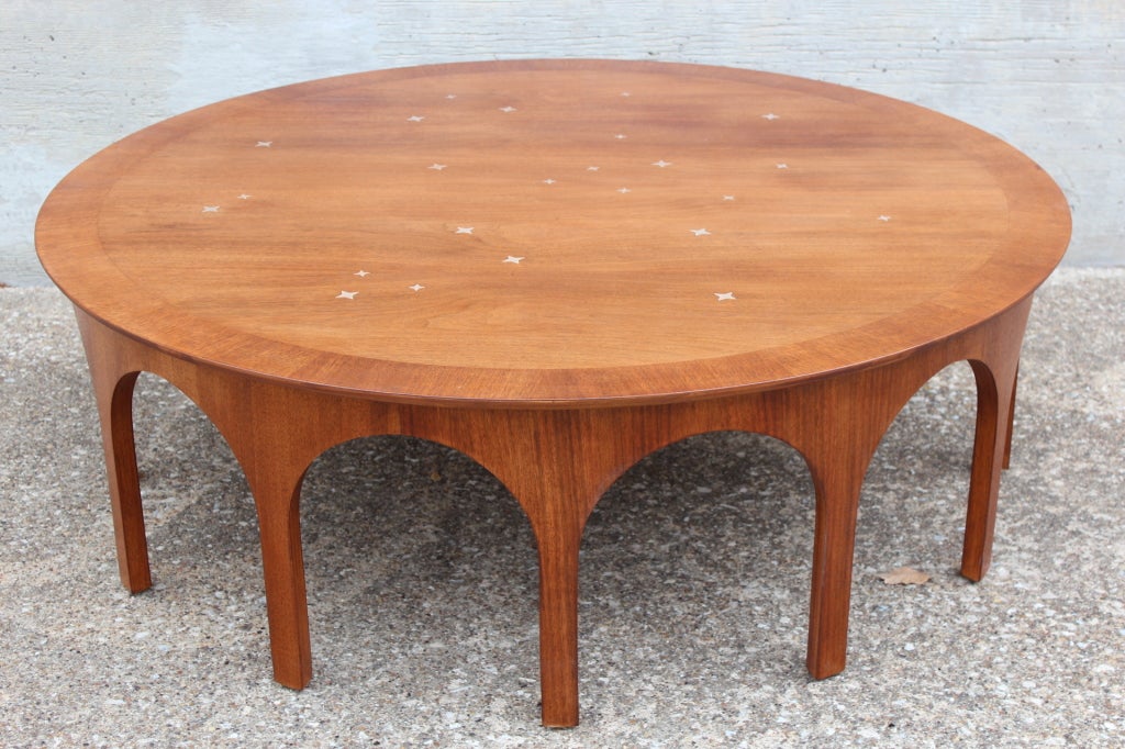Rare coffee table designed by T.H. Robsjohn-Gibbings for Widdicomb. This variation was special ordered with inset aluminum stars.