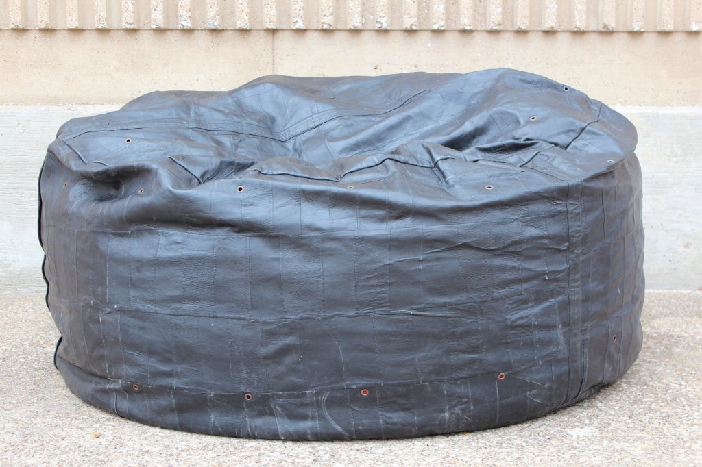A large black leather patchwork beanbag attributed to DeSede. Leather has a nice patina and the chair sits comfortably.