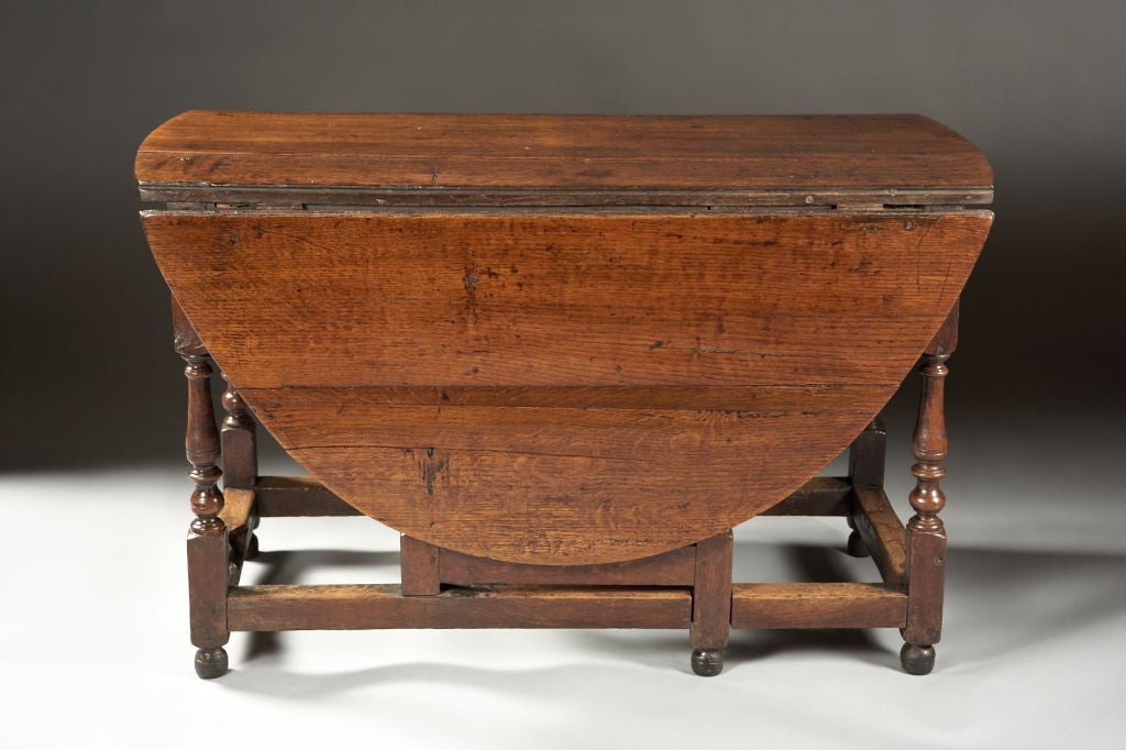 A Mid-18th Century English Oak Gateleg Dining Table