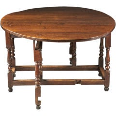 A Mid-18th Century English Oak Gateleg Dining Table