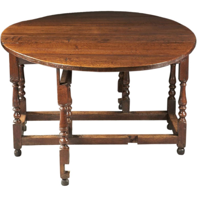 A Mid-18th Century English Oak Gateleg Dining Table For Sale