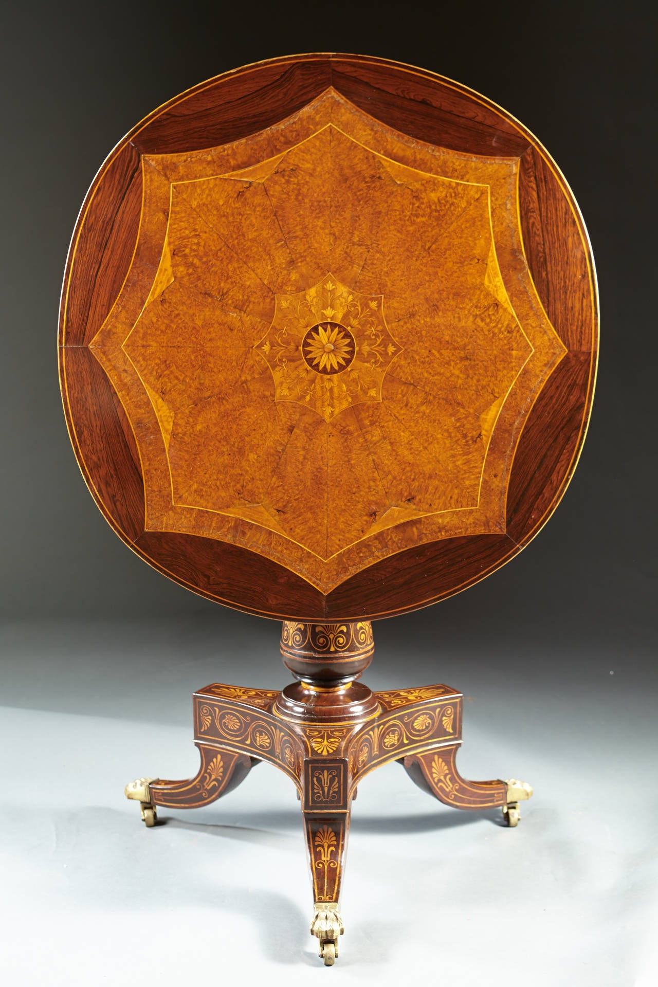 A remarkable tilt top table of 