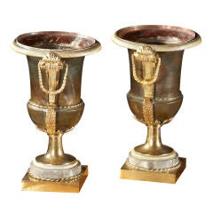 A Pair of French Louis XVI Gilt-Metal and Bronze Urns A Pair of French Louis XVI Gilt-Metal and Bronze Urns