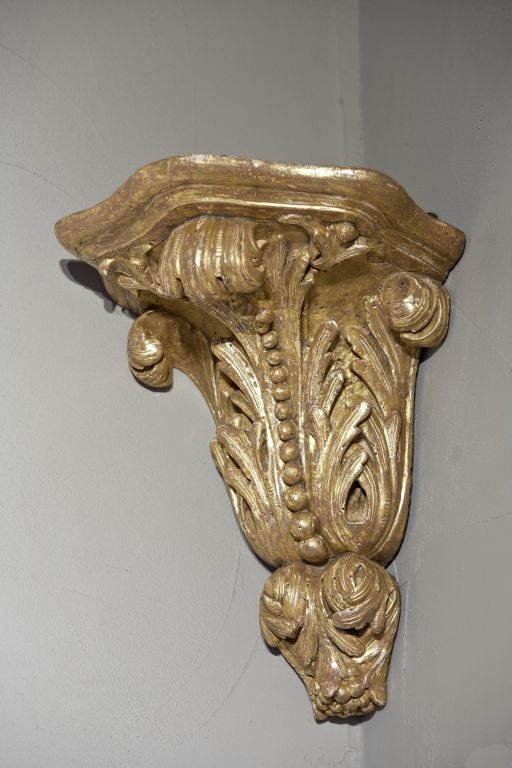 18th Century and Earlier An Unusual Pair of English George II Giltwood Corner Brackets For Sale
