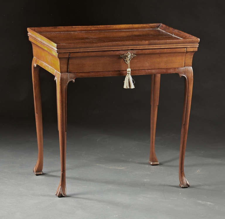 An English George II Mahogany Tea Table on Cabriole Legs