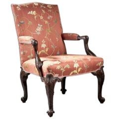 An English Mahogany Rococo Chippendale Gainsborough Armchair