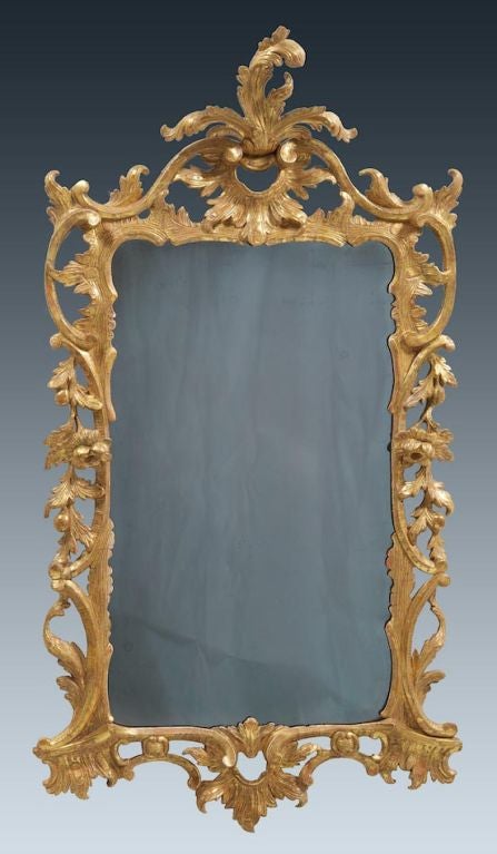 An Elegant English Rococo Carved Giltwood Mirror, Chippendale