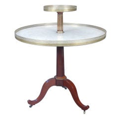 A Mahogany Two-Tiered French Directoire Serviteur Server Round