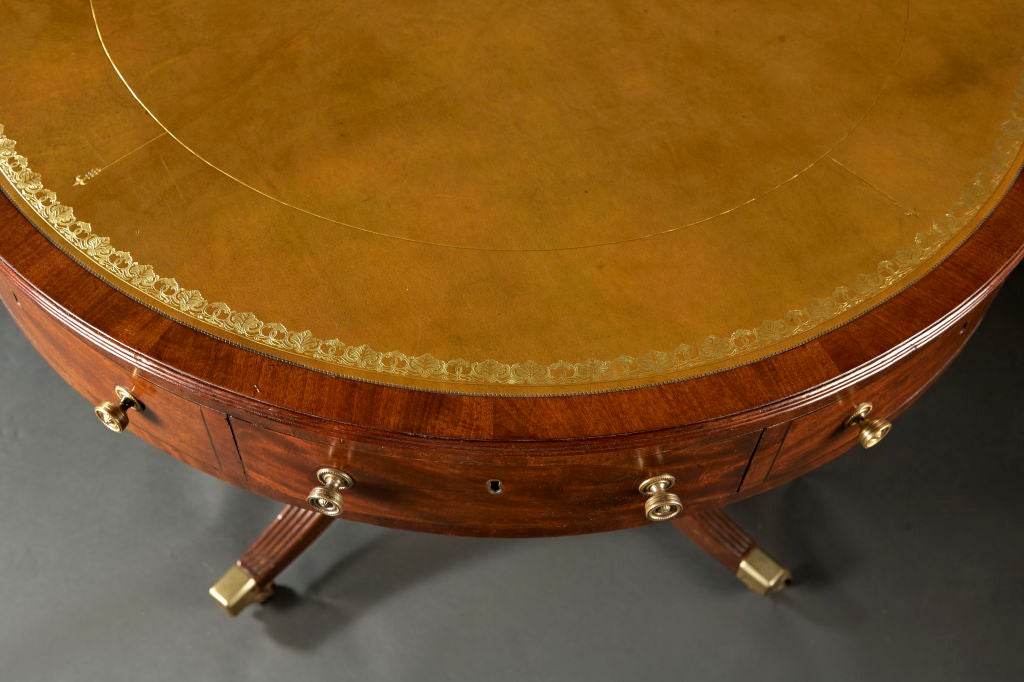 An English Sheraton Mahogany Drum Library Table 1