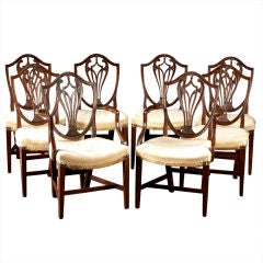 A Set of Eight Mahogany Hepplewhite Shieldback Dining Chairs