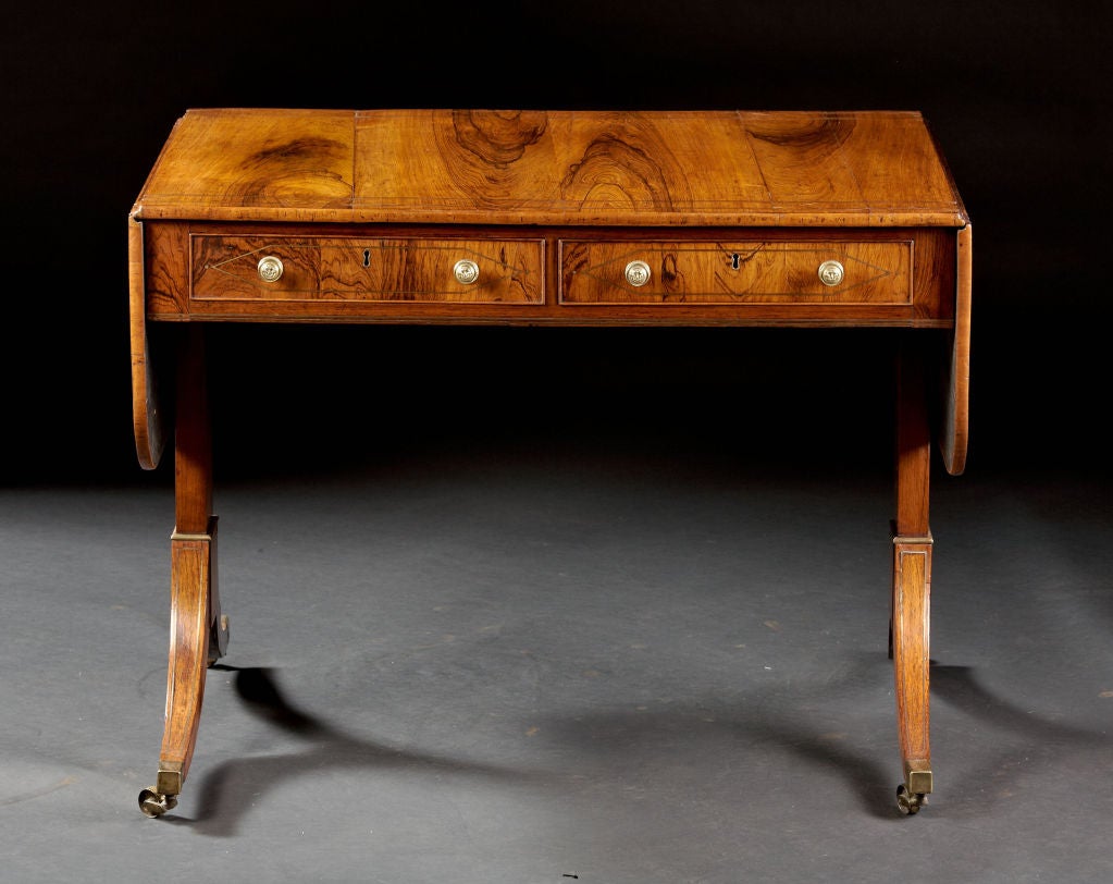 A Brass Inlaid English Regency Rosewood Sofa Table