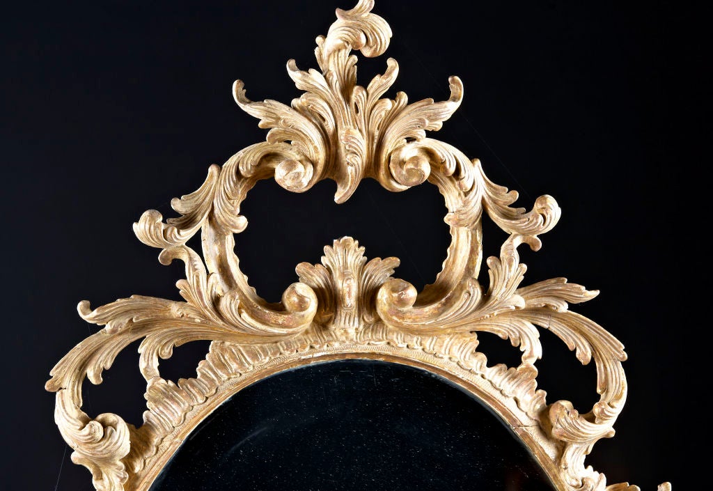 18th Century and Earlier An Oval Giltwood English Chippendale Mirror