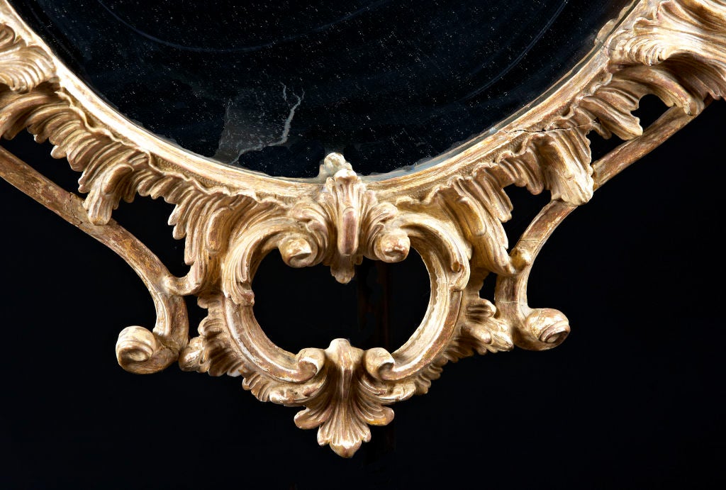 An Oval Giltwood English Chippendale Mirror 1