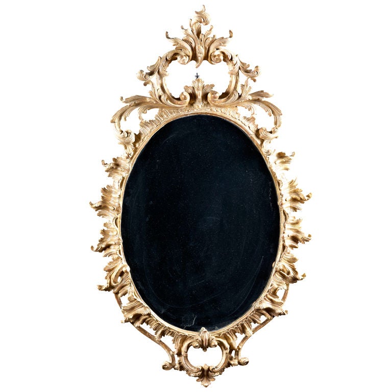 An Oval Giltwood English Chippendale Mirror