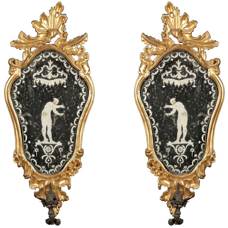 A pair of Italian Giltwood Etched Mirrors with Sconce Arms For Sale