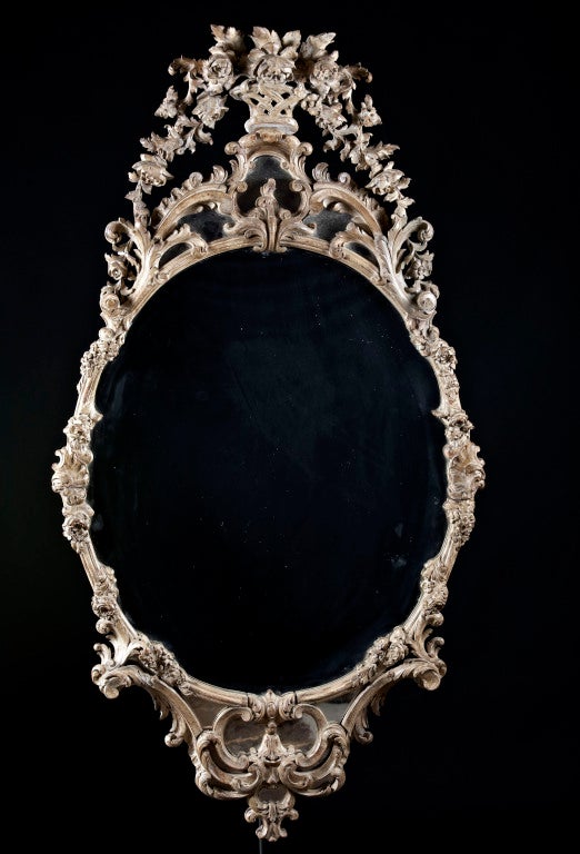 An 18th Century Carved and Painted Walnut Mirror