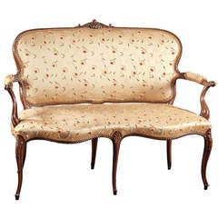 An 18th Century English Carved Mahogany Serpentine Settee