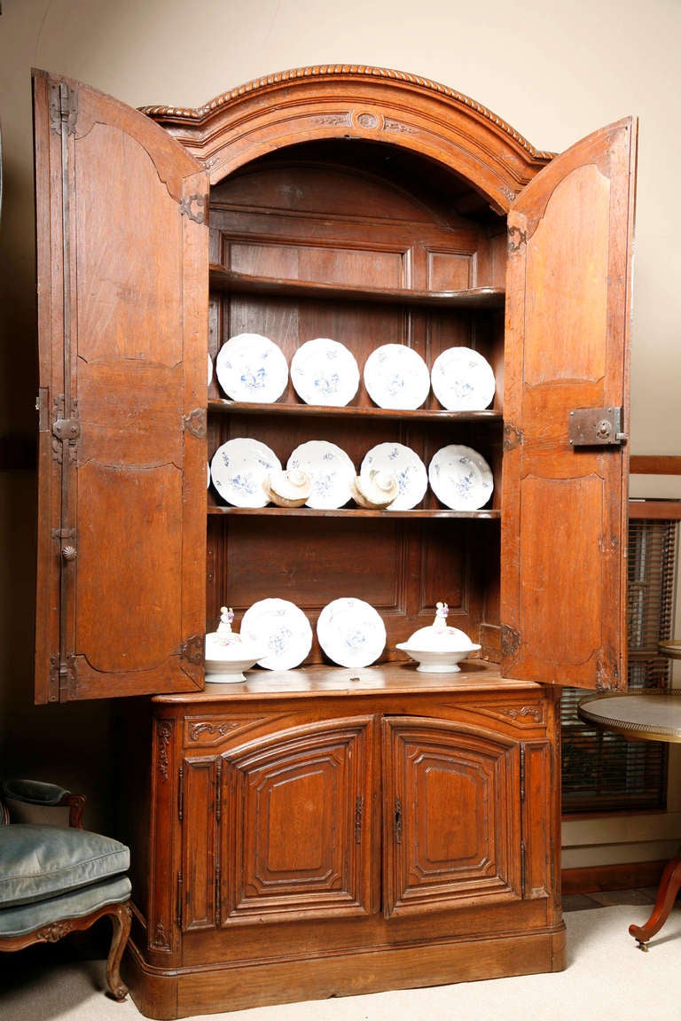 An 18th Century French Louis XV Carved Oak Cabinet In Excellent Condition For Sale In Woodbury, CT