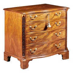 A Compact Chippendale Mahogany and Sabicu Serpentine Chest