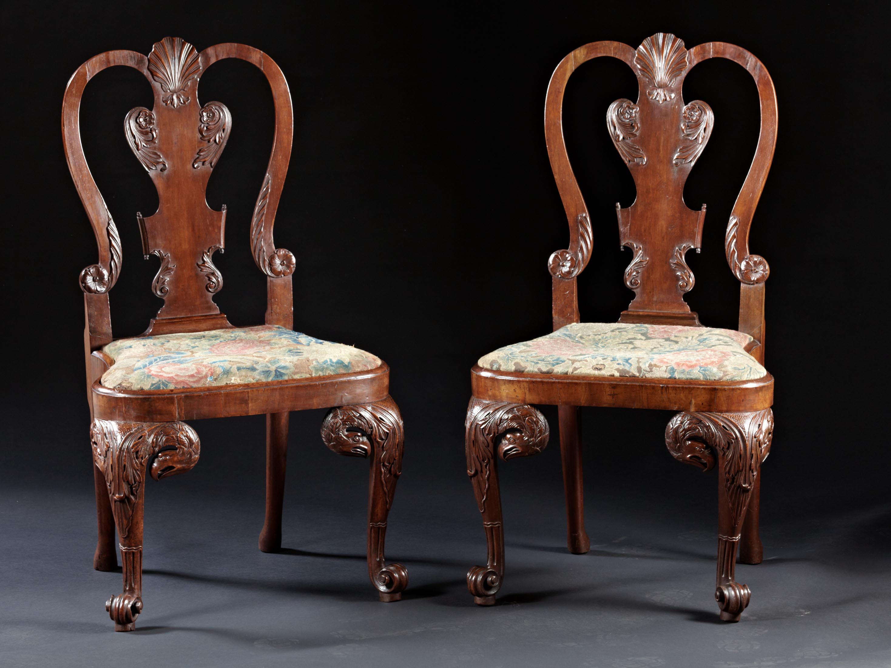 A Rare Pair of George II Eagle and Shell Carved Walnut Side Chairs
