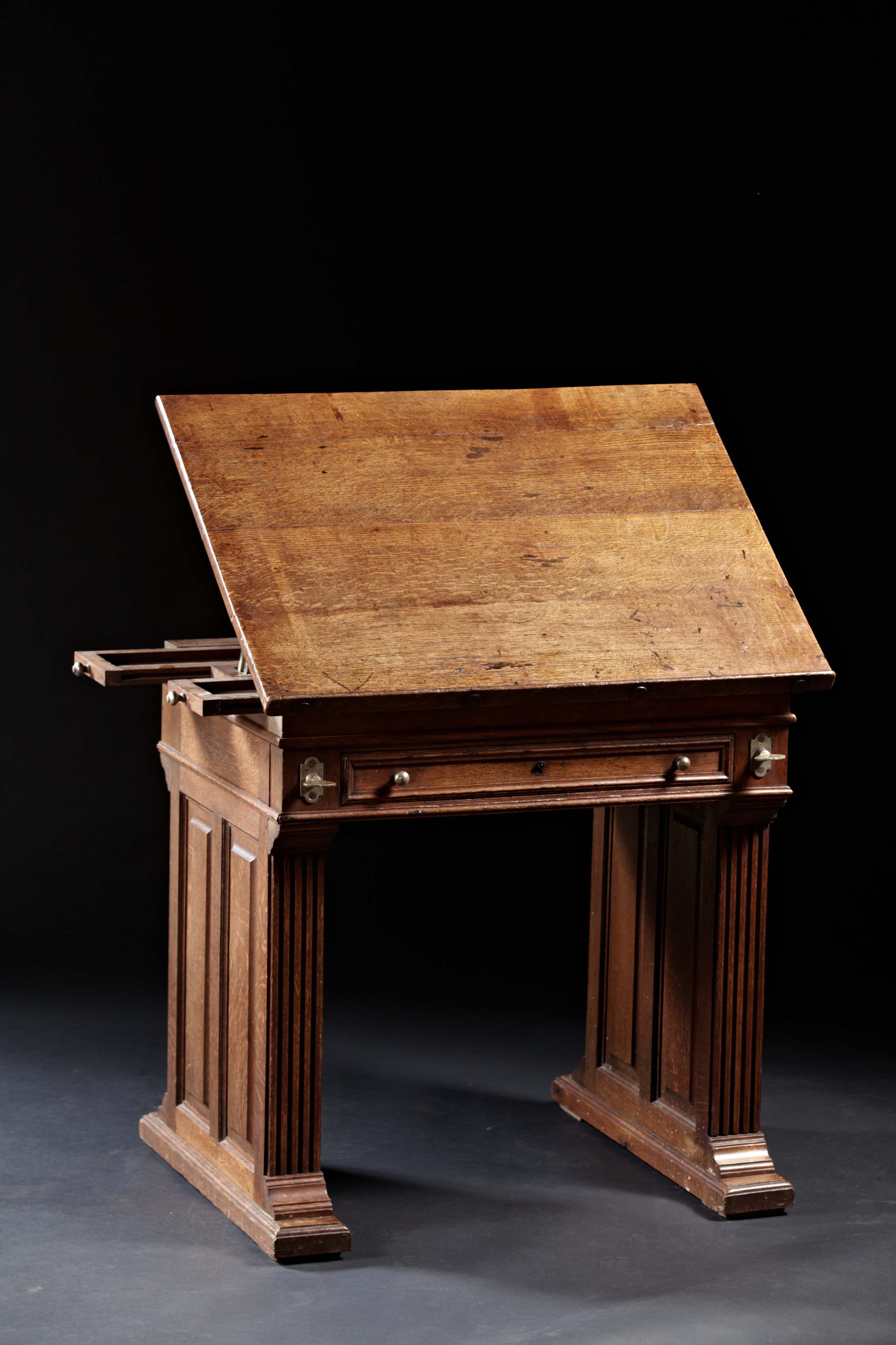 An Arts and Crafts Period Oak Drafting Table with Adjustable Slope